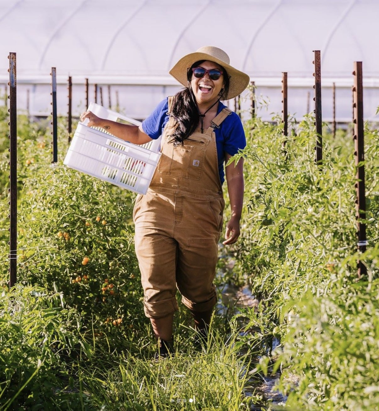 image of woman happily farming